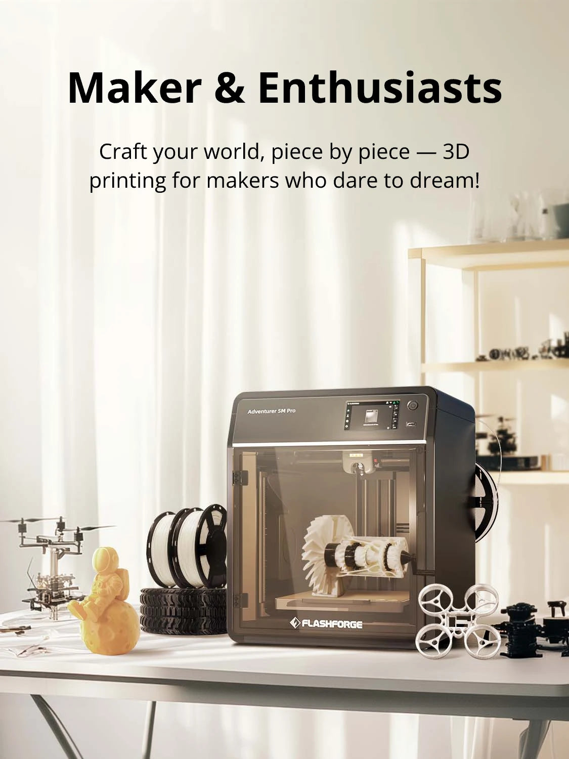 Flashforge 3D printer with maker projects and tools displayed."